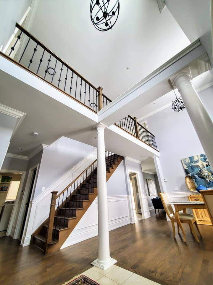 Bright modern two-story residential foyer